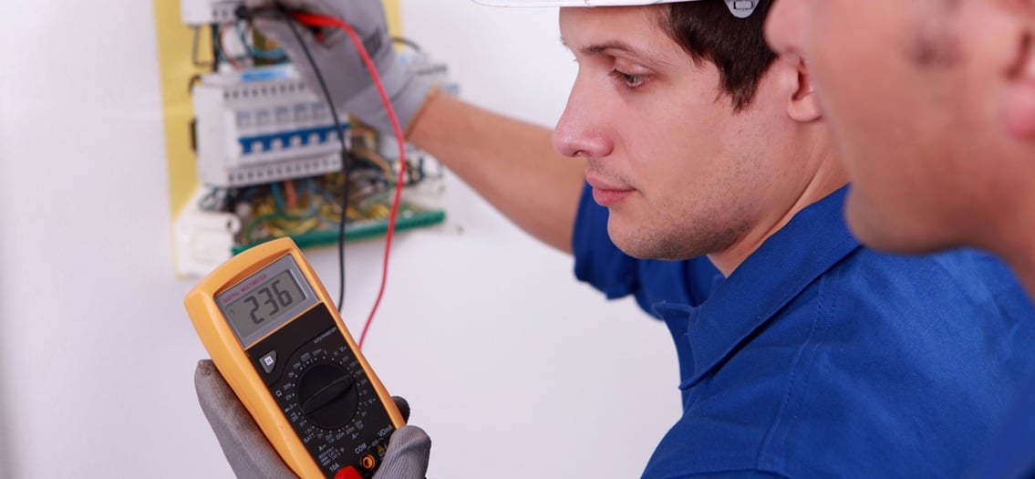 Two technical engineers checking electrical equipment